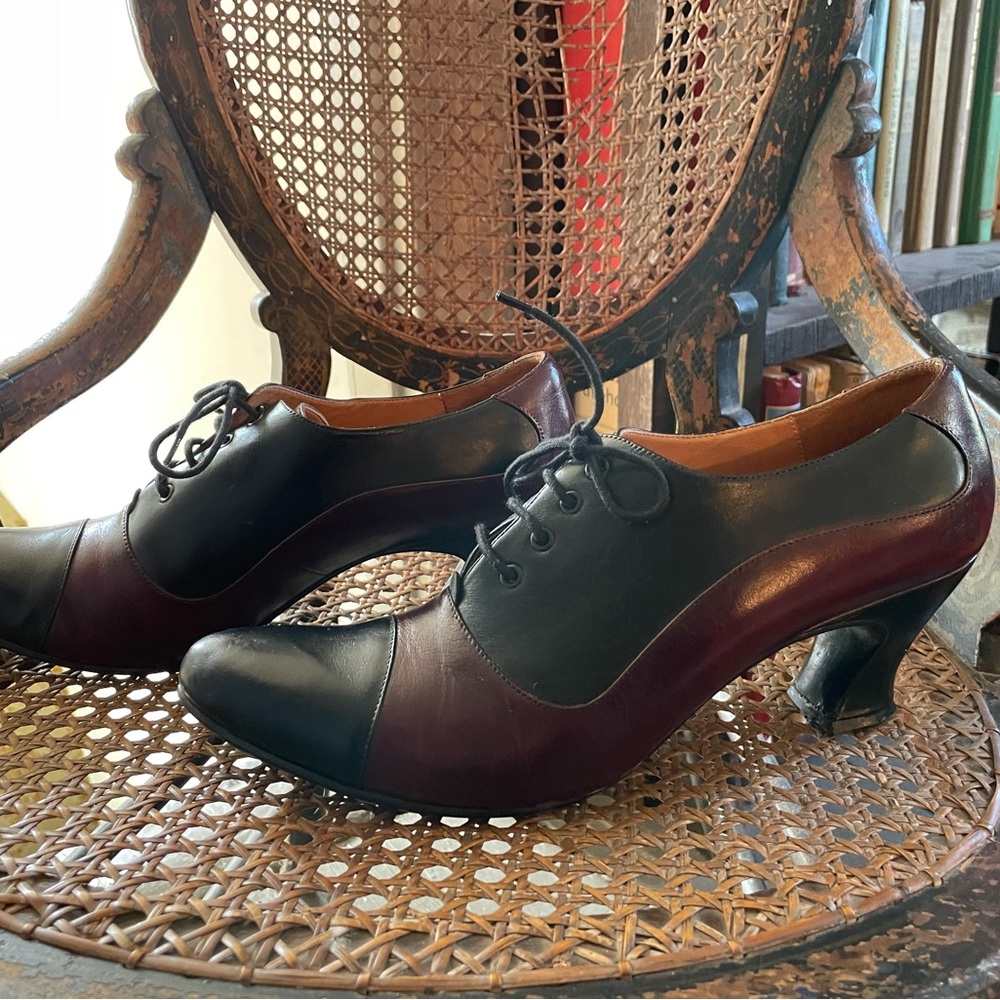 John Fluevog Black and Burgundy Lace-Up Heels
